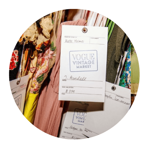 Designer dresses for resale hanging on racks and displayed on mannequins