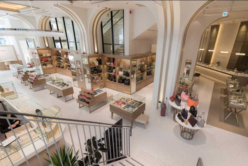 Luxury consumption patterns in Japan emphasizing careful ownership and product preservation at a resale boutique