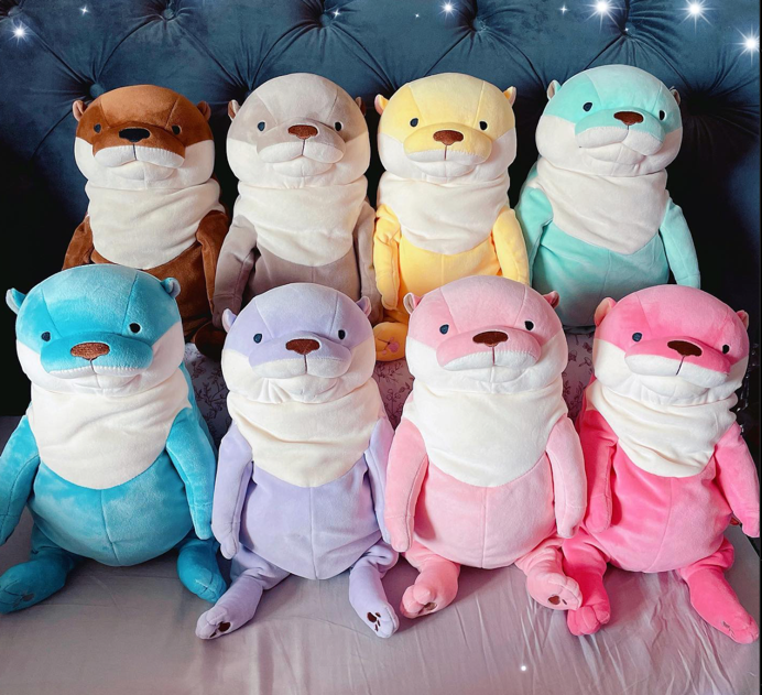 colorful otter plushies