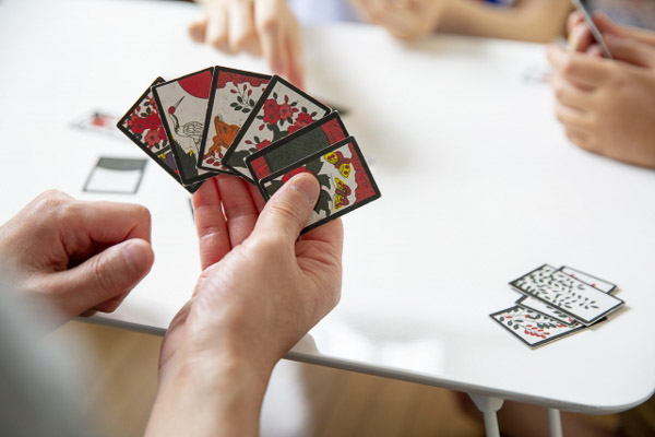 A players hand with six Hanafuda cards.