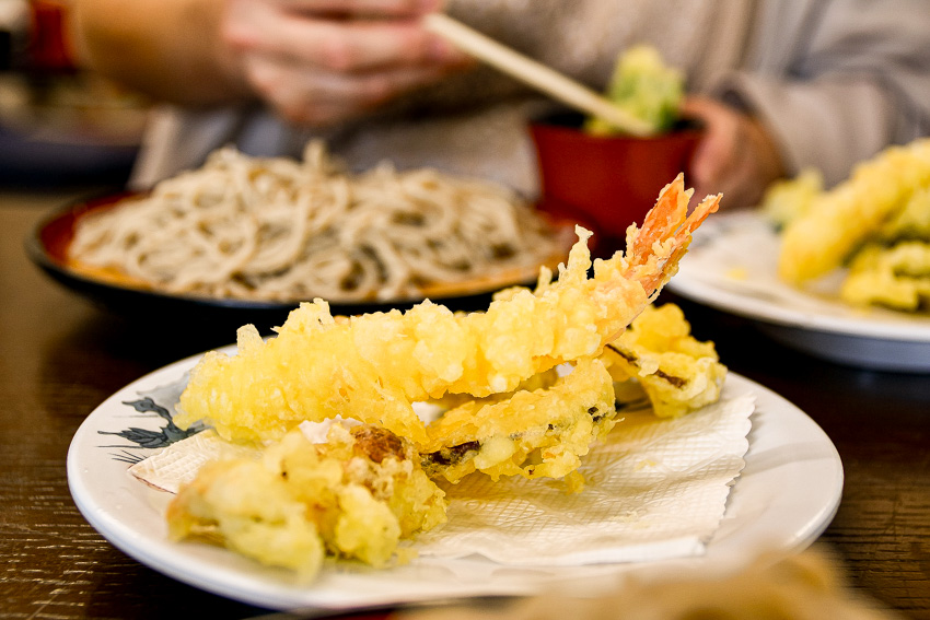 Close up of a plate with Japanese  tempura on a dining table.