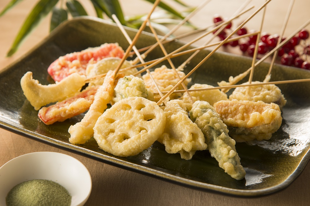 Plate full of tempura skewers