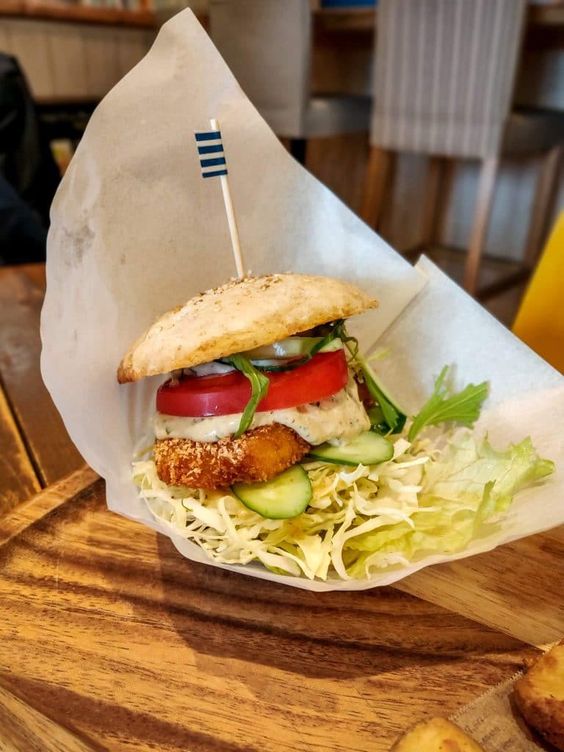 A close up image of a plant-base burger in a restaurant in Tokyo