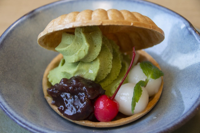 Shell like monaka with matcha ice cream, anko, cherry and mochi inside.