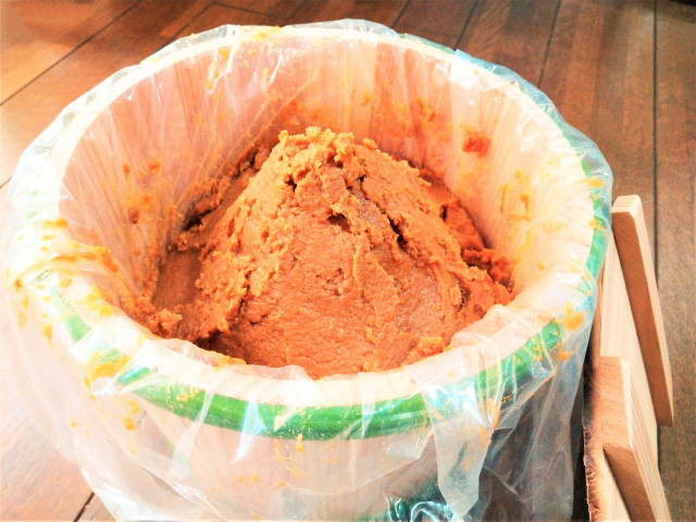 Shinshu miso paste in a wooden barrel