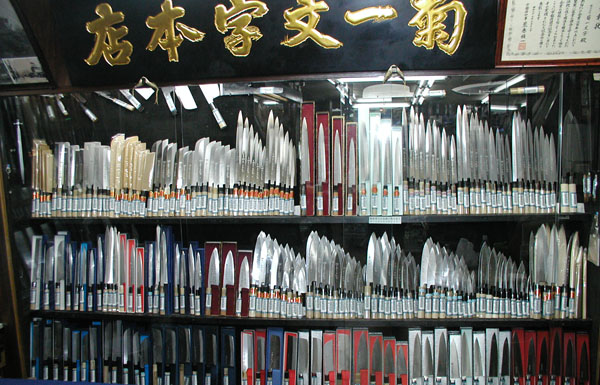 A wall of knives inside the Kikuichimonji shop in Kyoto