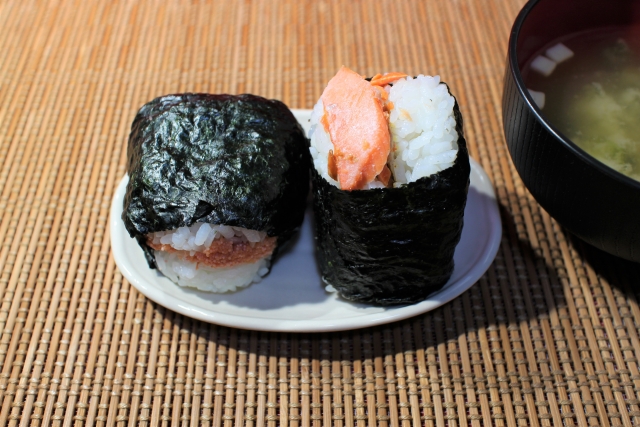 Onigiri, or rice balls, with mentaiko and salmon.