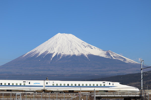 Snow capped Mount Fuji with the Sanyo shinkansen in the foreground