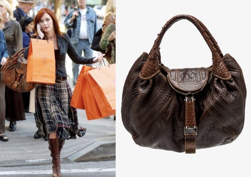 Woman crossing the street carrying Hermès shopping bags alongside a Fendi Spy Bag, as seen in The Devil Wears Prada