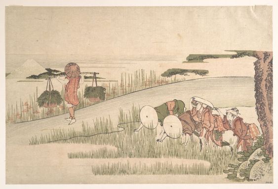 An old Japanese drawing of people picking up rice and carrying it away