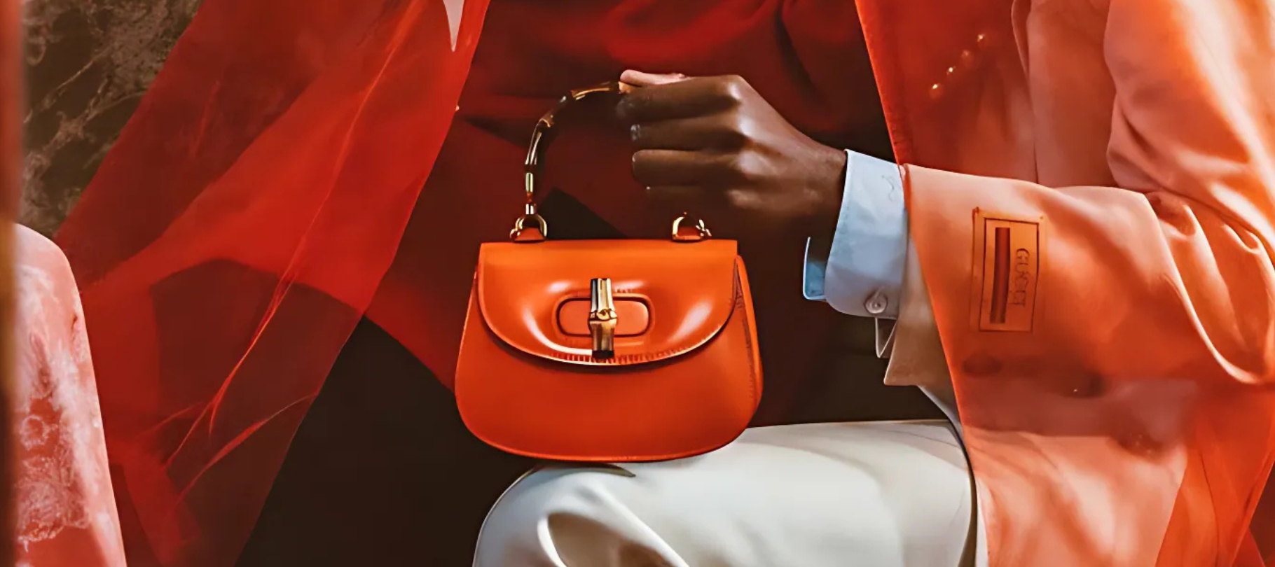 Gucci Bamboo 1947 in bright orange color from a campaign