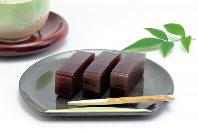 Three pieces of sliced yokan on a plate