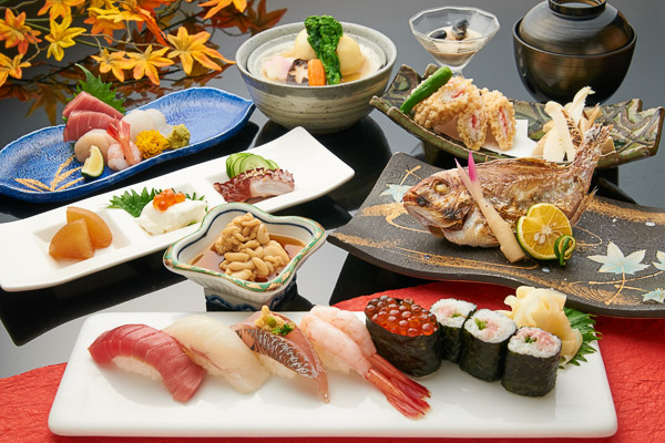 Japanese dishes laid out on a dinner table