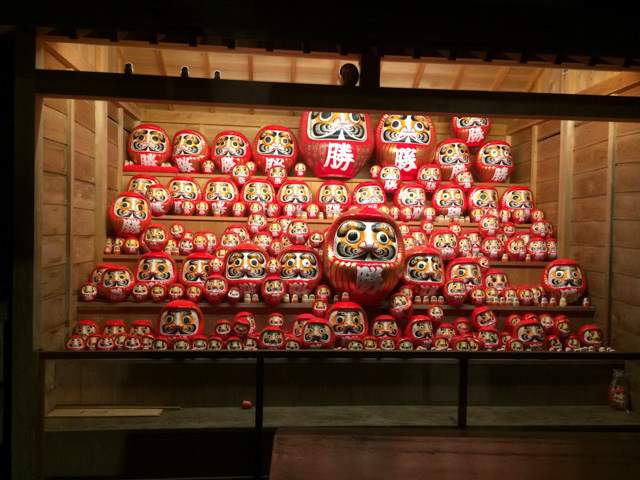 A collection of hundreds of daruma dolls