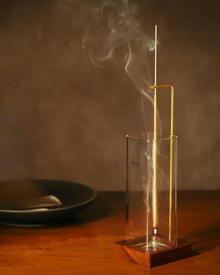 Sleek and modern incense holder made out of glass and wood