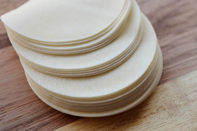 A stack of round shaped gyoza wrappings