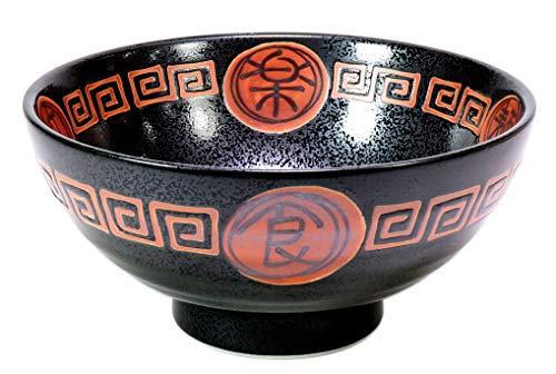 A black ceramic noodle bowl with red ornaments