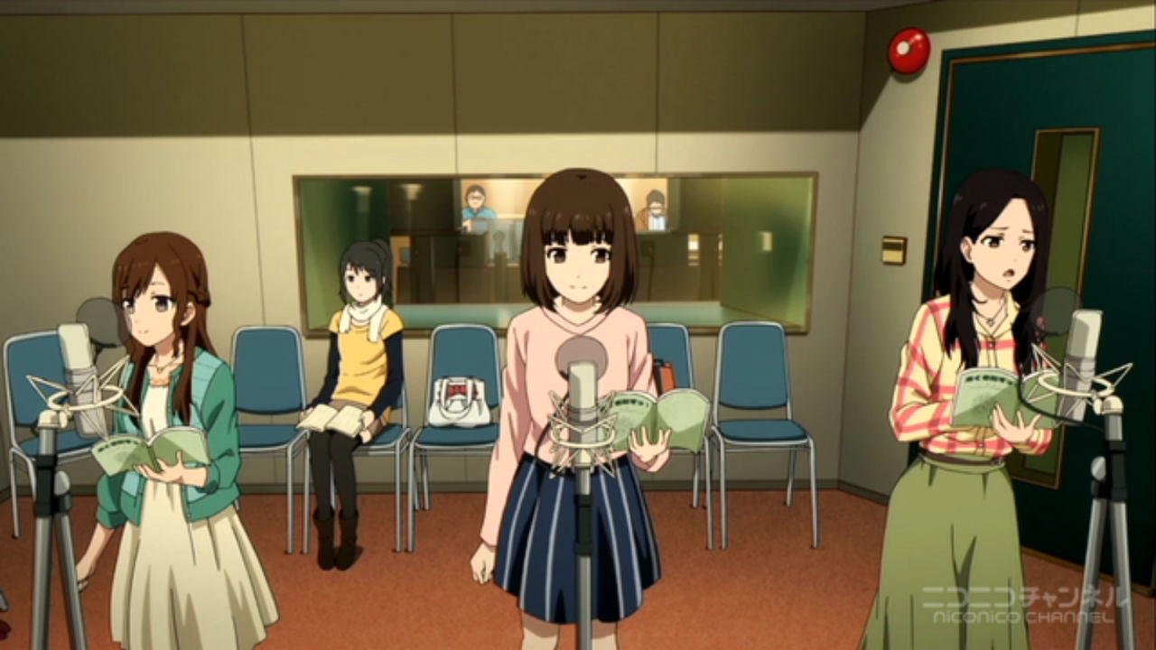 Four anime character inside a studio, three are in from of a microphone and the remaining one is sitting down on the back