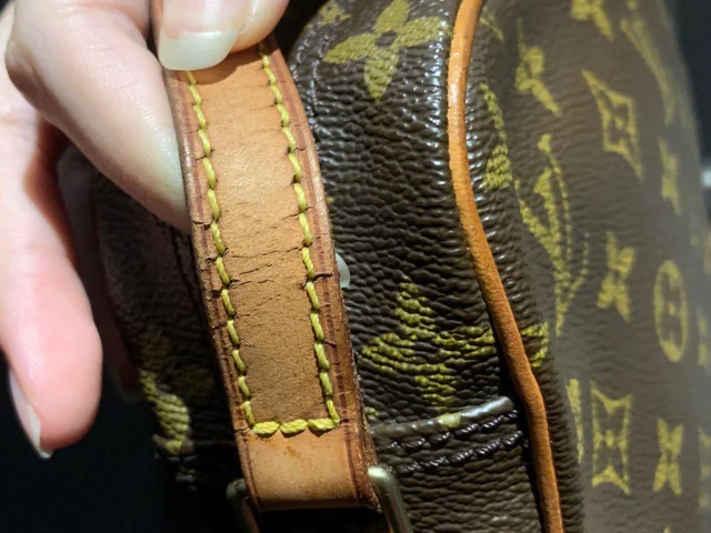 Louis Vuitton handle with signs of dryness