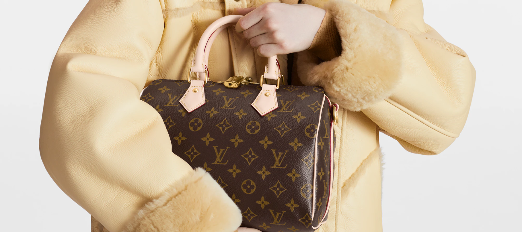 Carrying a Louis Vuitton Speedy Bag