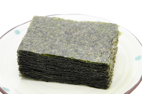 A stack of square shaped nori sheets 