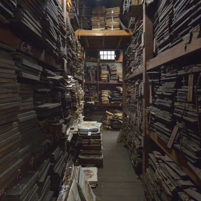 View of Unsodo's storage room filled with wood blocks used for printing.