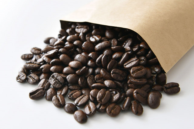 An open bag with coffee beans
